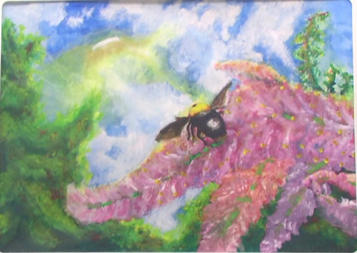 花から飛び立つクマンバチ